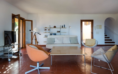 Living space with french doors opening to terraces